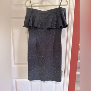 Stunning off the shoulder knee length dress. Sparkly chrome & stretchy material